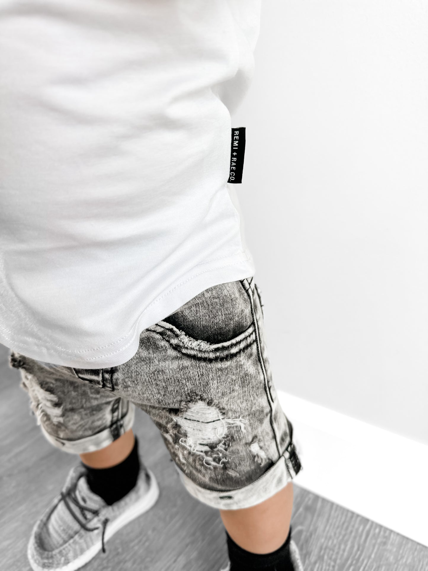 ACID WASH DISTRESSED DENIM SHORTS
