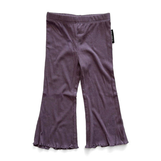 Purple flared pants on a white background