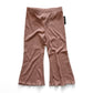 rose flared pants on a white background