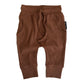 Brown baby pants with drawstring on a white background
